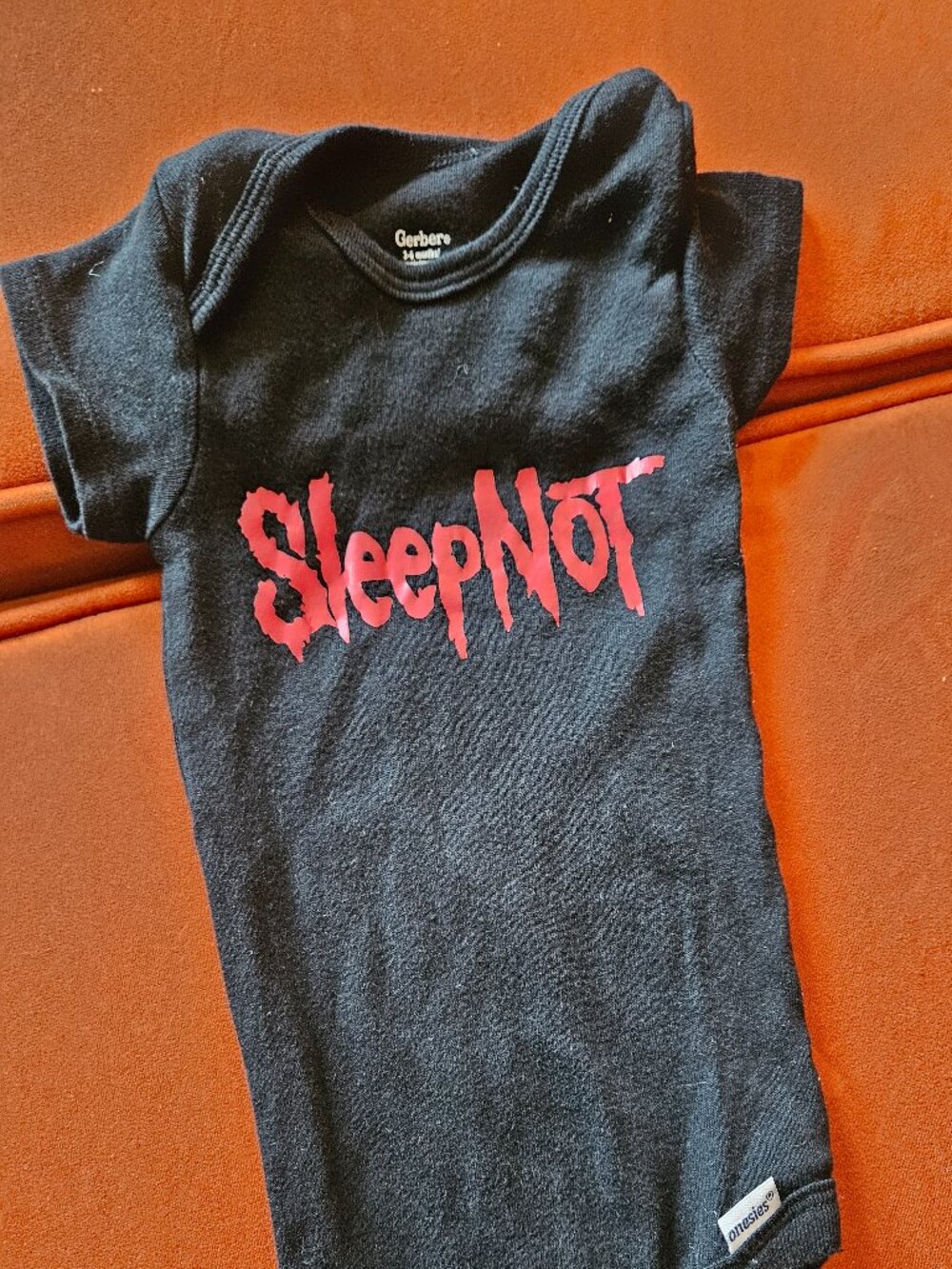 Sleepknot metal baby onesie
